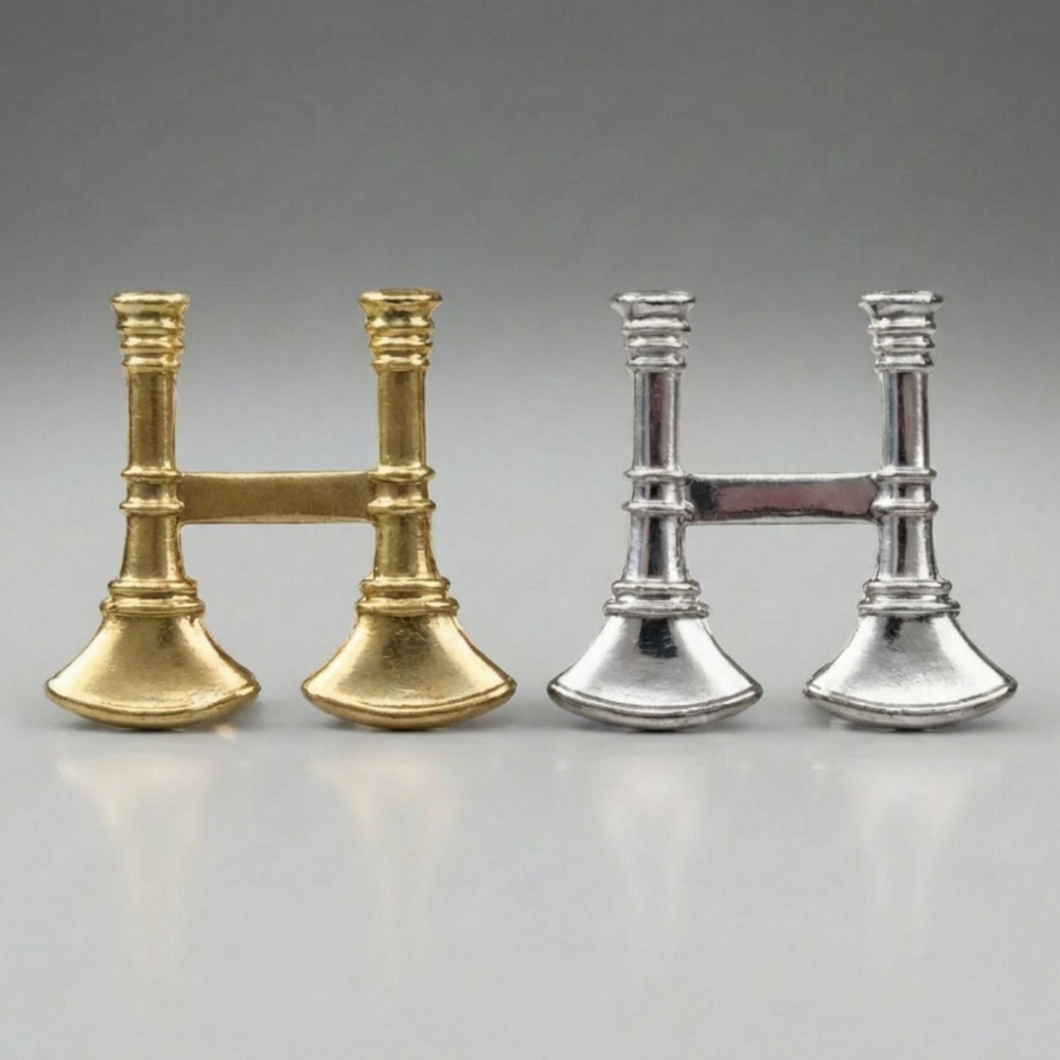 Two pairs of Firefighter Captain's Bugle Collar Pins (Pair) in Gold or Silver on a gray background