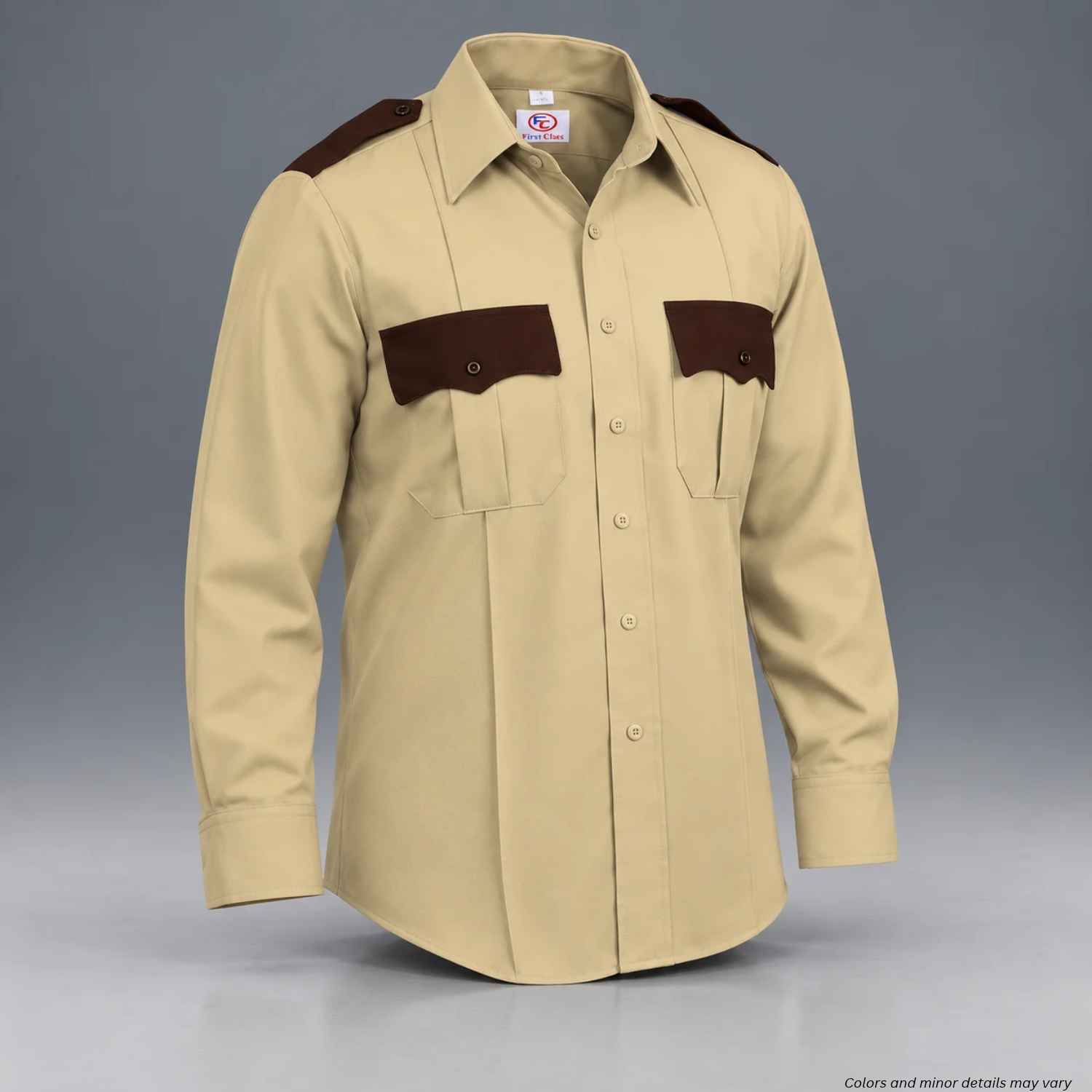 A long-sleeve khaki military-style uniform shirt with dark brown chest pockets and shoulder epaulets, displayed on a neutral gray background.