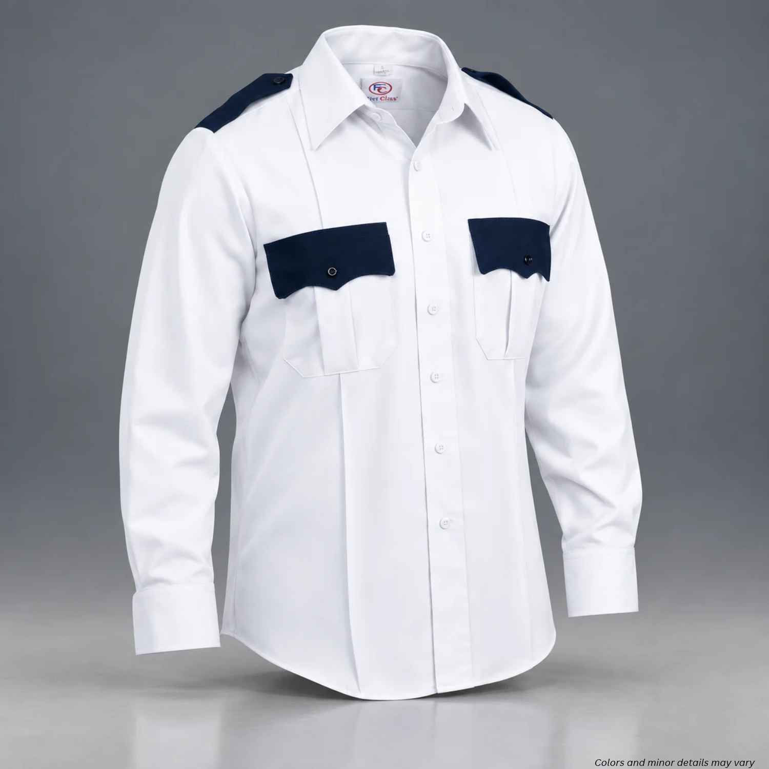 A white long-sleeve uniform shirt with dark navy blue shoulder epaulets and matching chest pocket flaps, displayed on a neutral gray background.