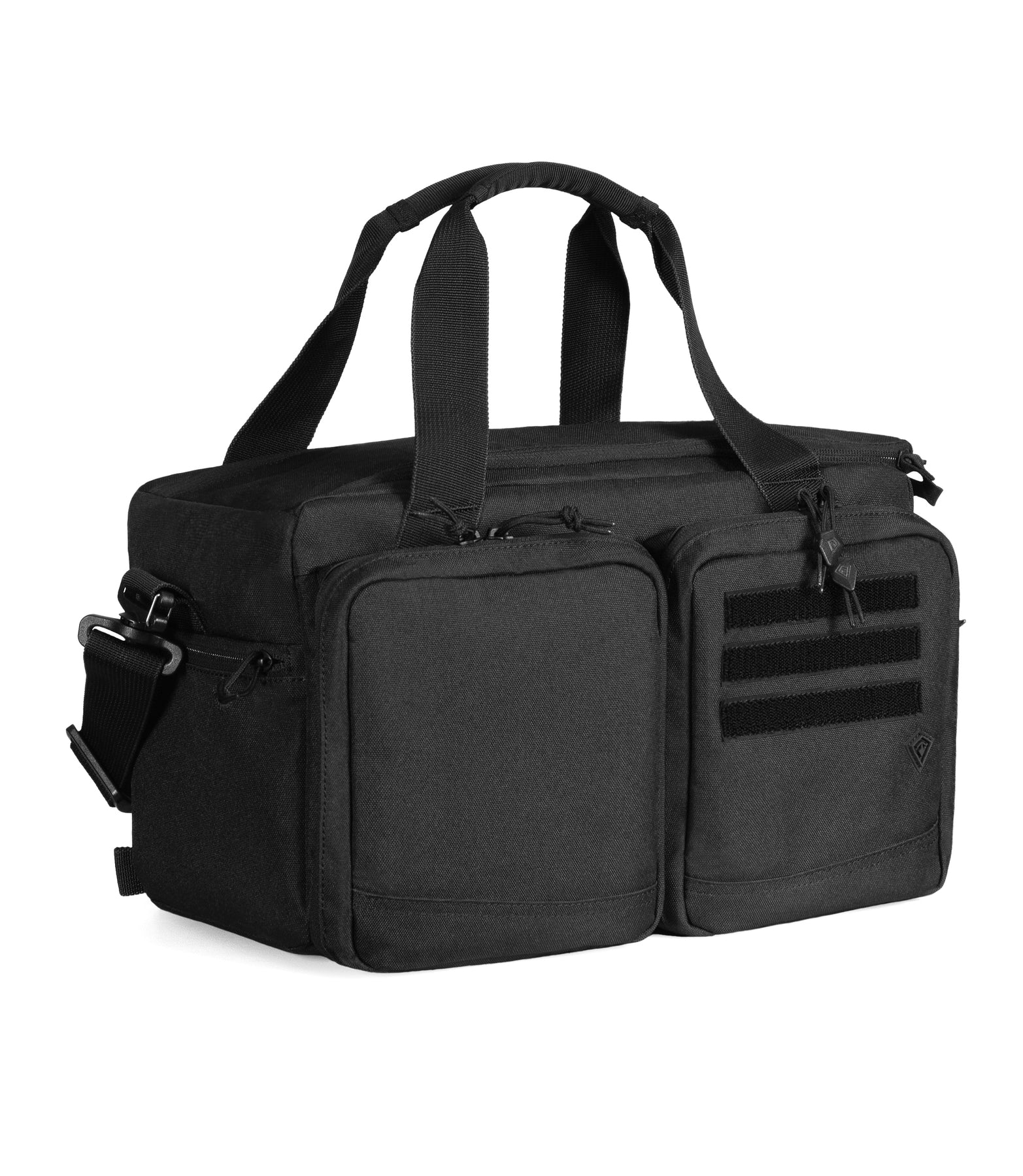 First Tactical Caliber Range Bag in black, featuring durable 600D polyester, multiple pockets, and adjustable straps for easy transport.