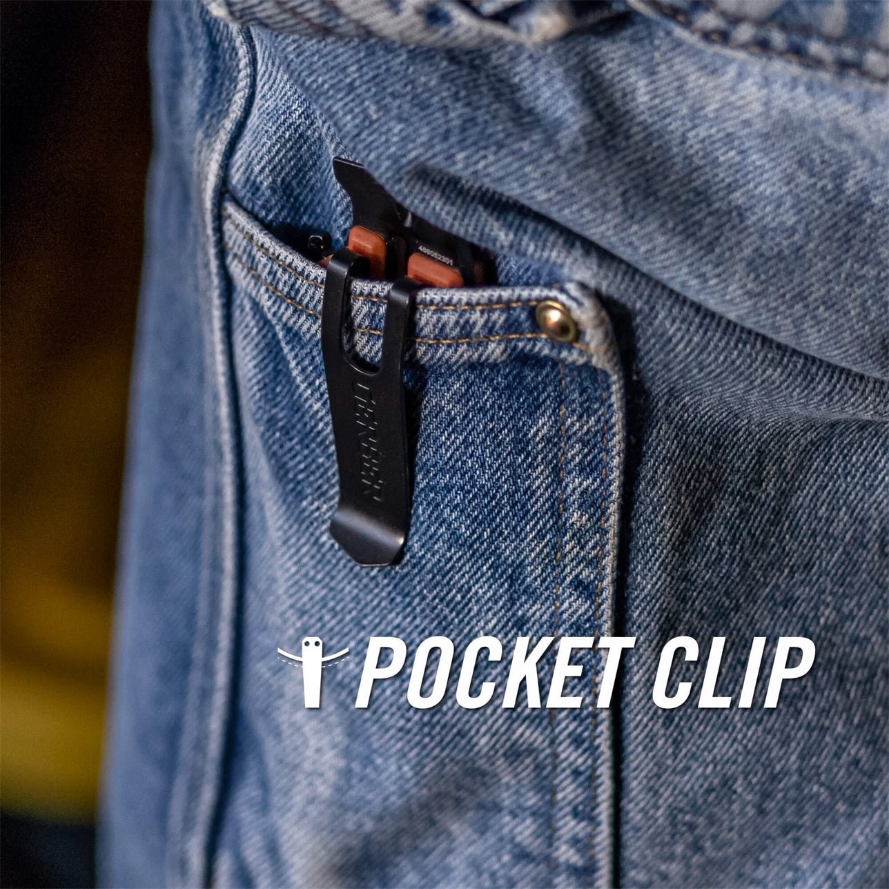 Pocket clip attached to a blue denim pocket with 'POCKET CLIP' branding.
