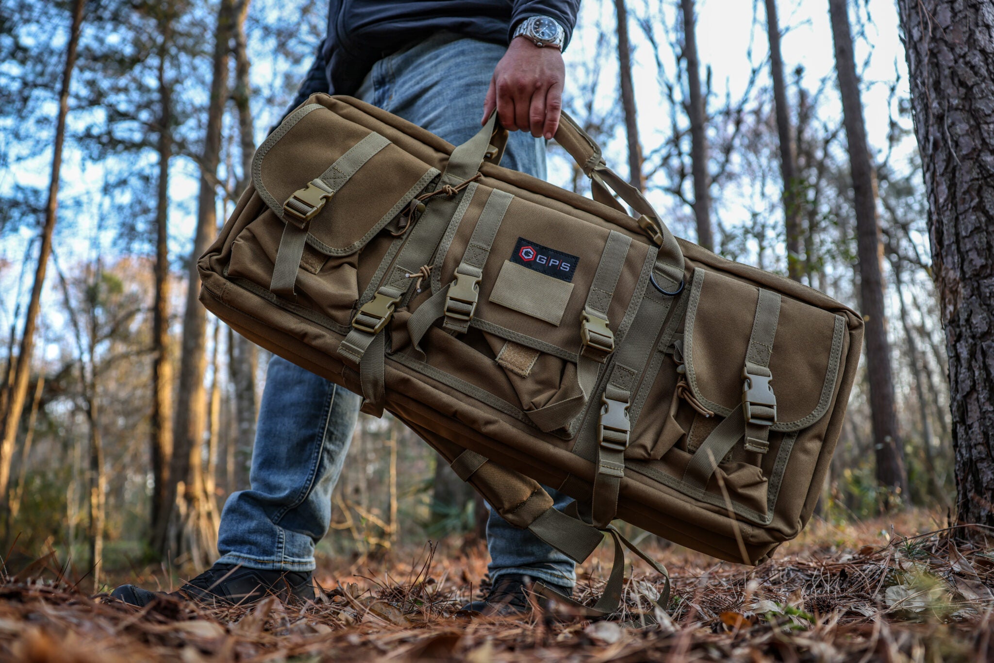 GPS Outdoors SRC42 42-inch rifle case in tan shown open outdoors, padded interior with foam lining