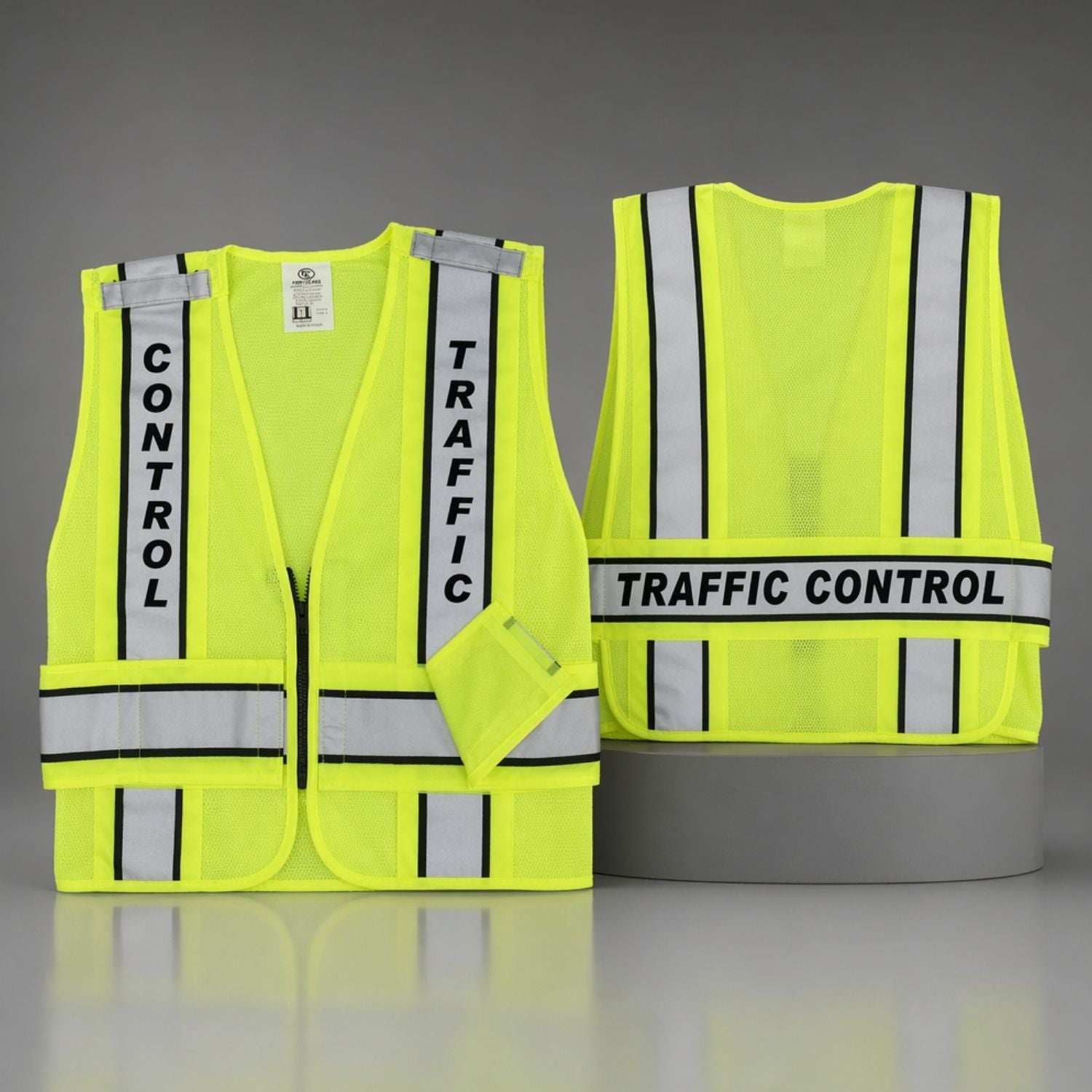 Yellow safety vest with 'Traffic Control' text on a gray background