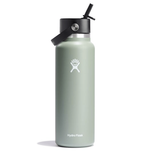 Hydro Flask wide mouth insulated water bottle in green with black flex straw cap for easy sipping.