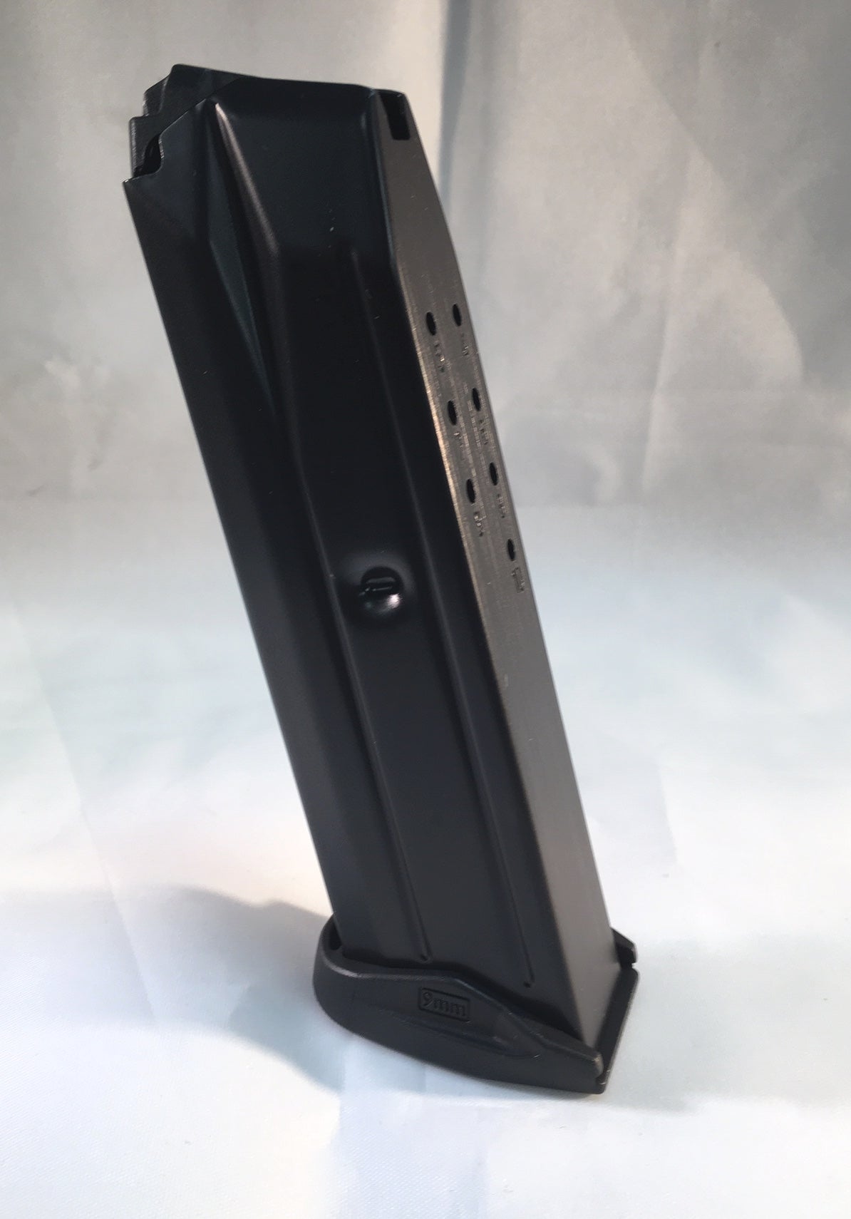 IWI Masada 9mm steel magazine with polymer baseplate, designed for durability and performance.