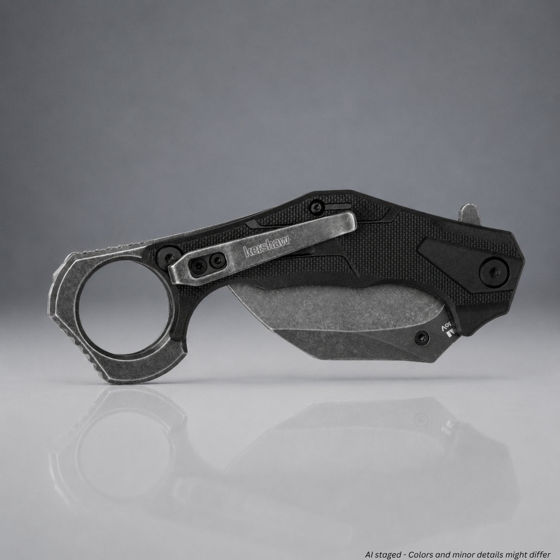 Kershaw Outlier 2064 karambit folding knife closed right side, BlackWash steel backspacer with Kershaw engraving and steel finger ring