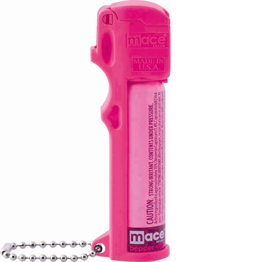 MACE Personal Pepper Spray in pink with safety controls for effective self-defense protection.