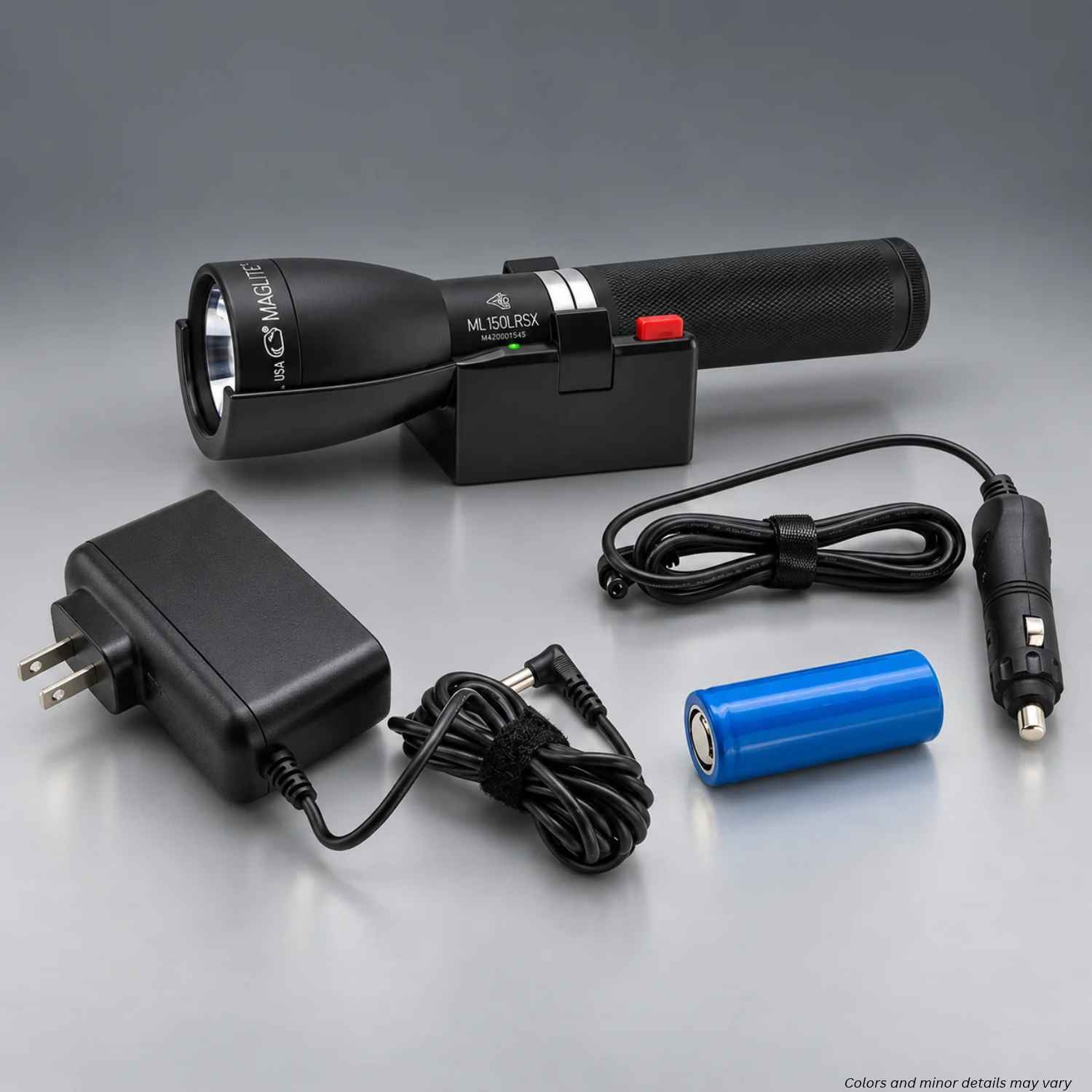 Maglite ML150LRSX-1019 rechargeable LED flashlight in charging cradle with 120V converter, 12V car adapter, and battery
