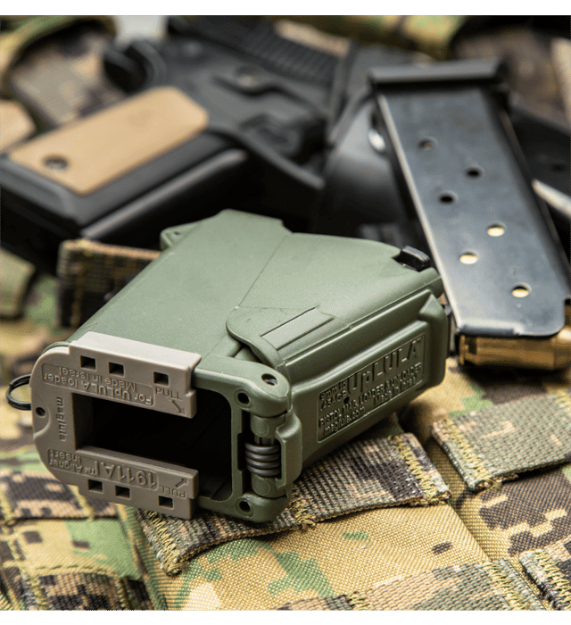 Maglula 1911AI insert attached to green UpLULA loader beside 1911 magazine