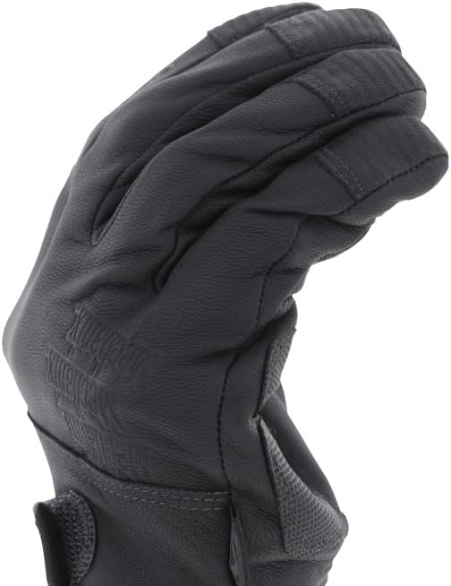 Black tactical glove on a white background