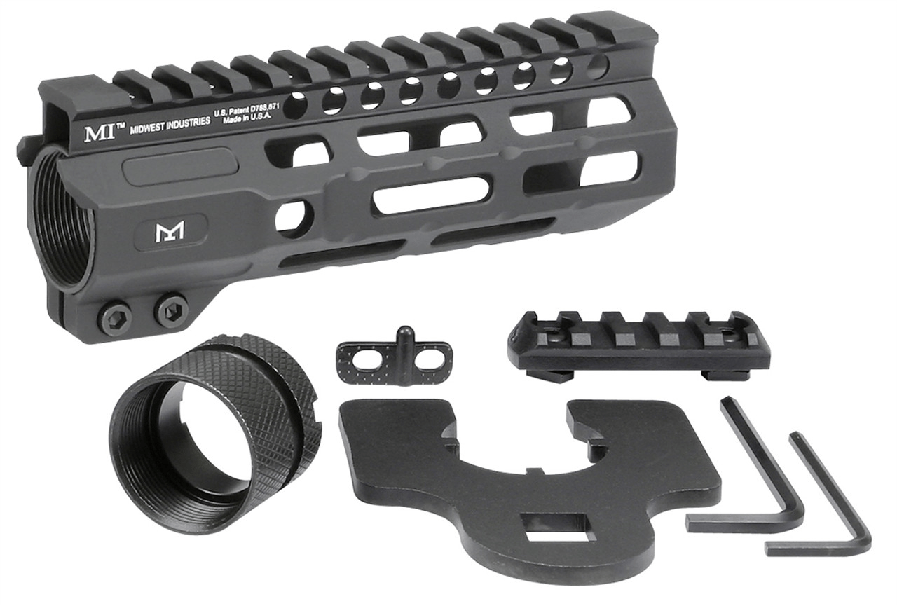 Midwest Industries Combat Rail Free Float Handguard with M-LOK accessories and mounting hardware in sleek black finish.