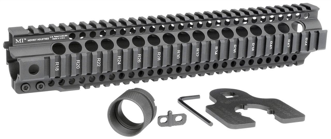 Midwest Industries Combat Rail T-Series handguard with barrel nut and wrench, featuring Picatinny rails for accessories.