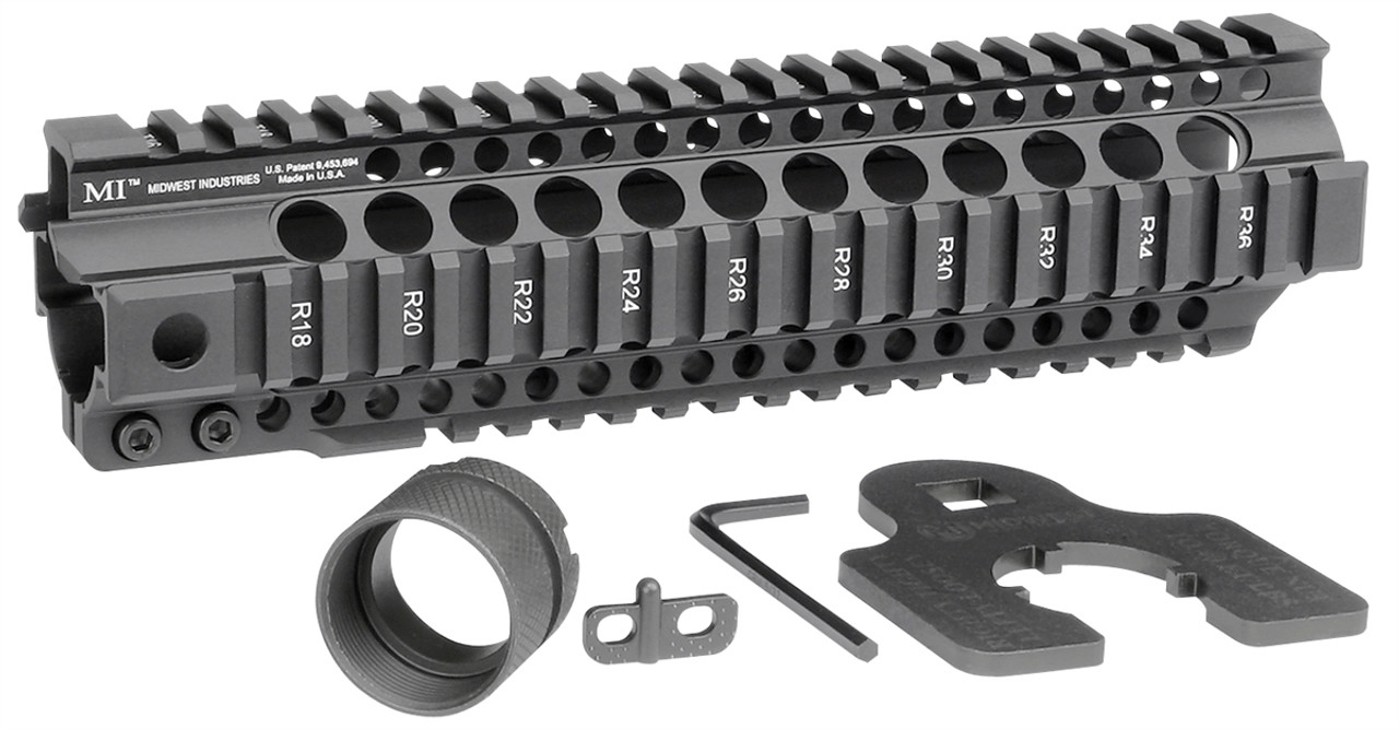 Midwest Industries Combat Rail T-Series free float handguard with barrel nut and wrench for tactical firearms.