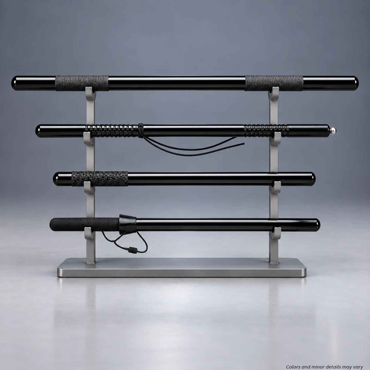 Monadnock MP polycarbonate straight batons 1000036 series in four grip styles on a display stand