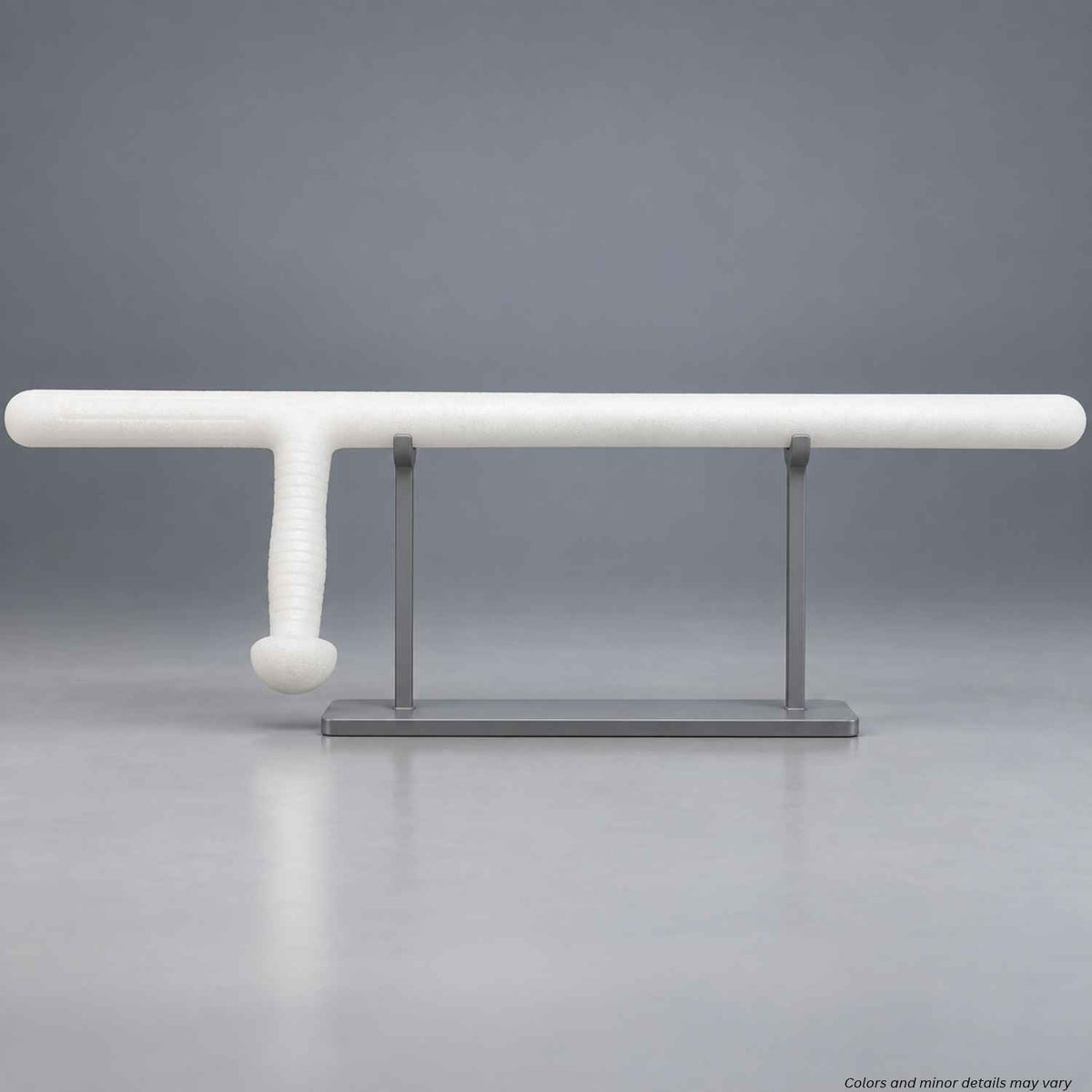 Monadnock PR-24 side-handle white foam training baton 1000322 resting on a display stand