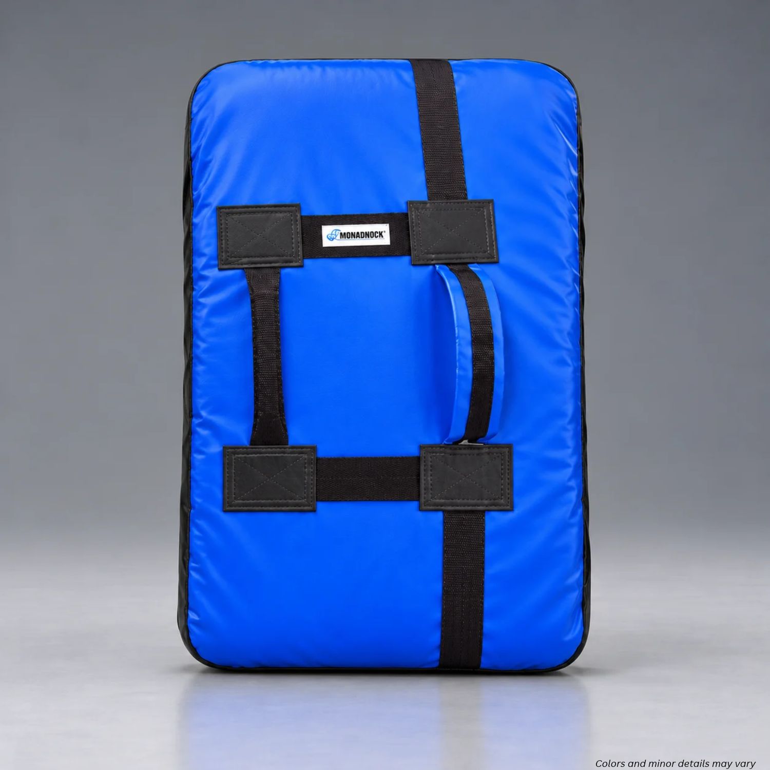 Rear of Monadnock UTB training bag with webbing straps and padded holding handle