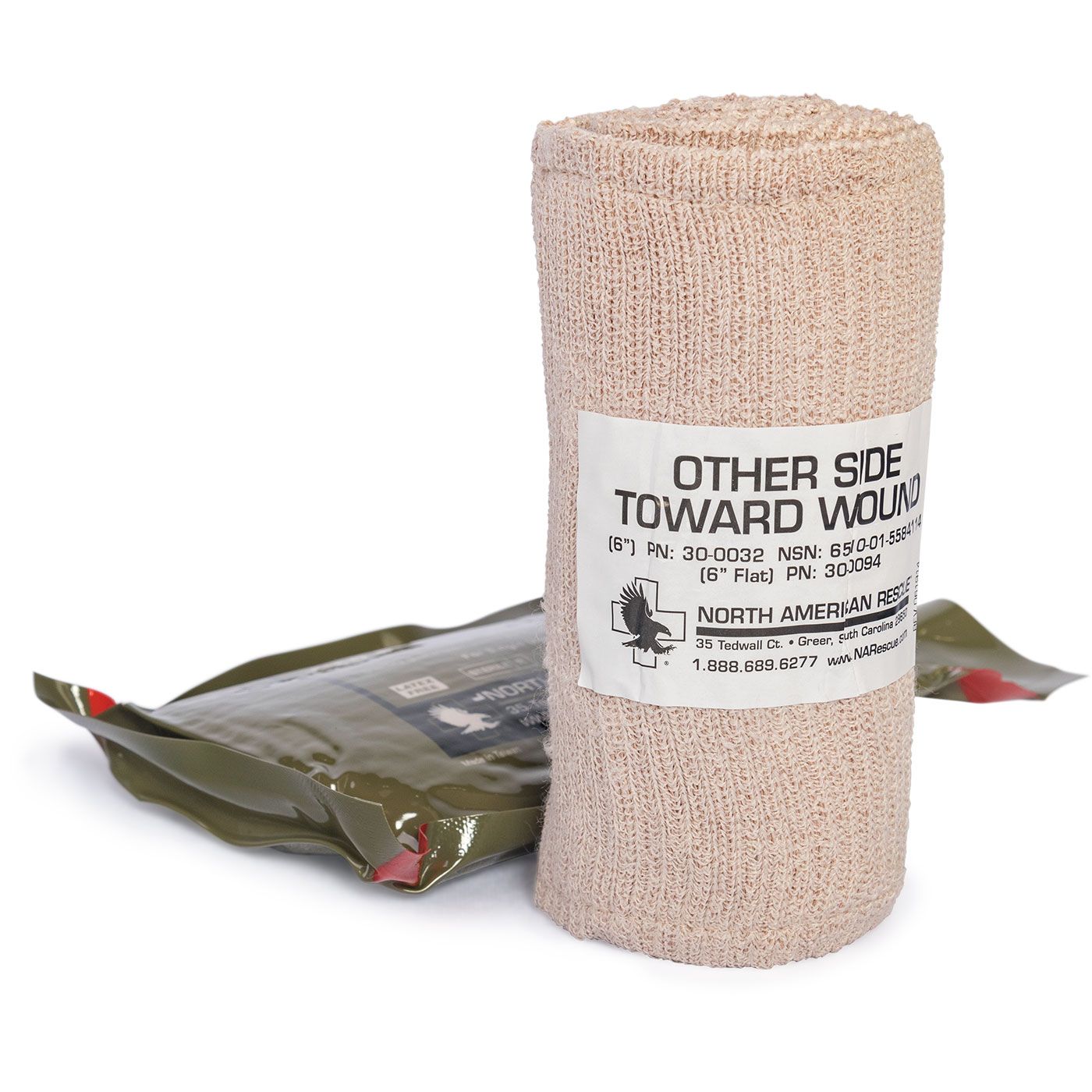 North American Rescue 6 inch Flat Emergency Trauma Dressing 30-0094, bandage in rolled configuration with product label on white background