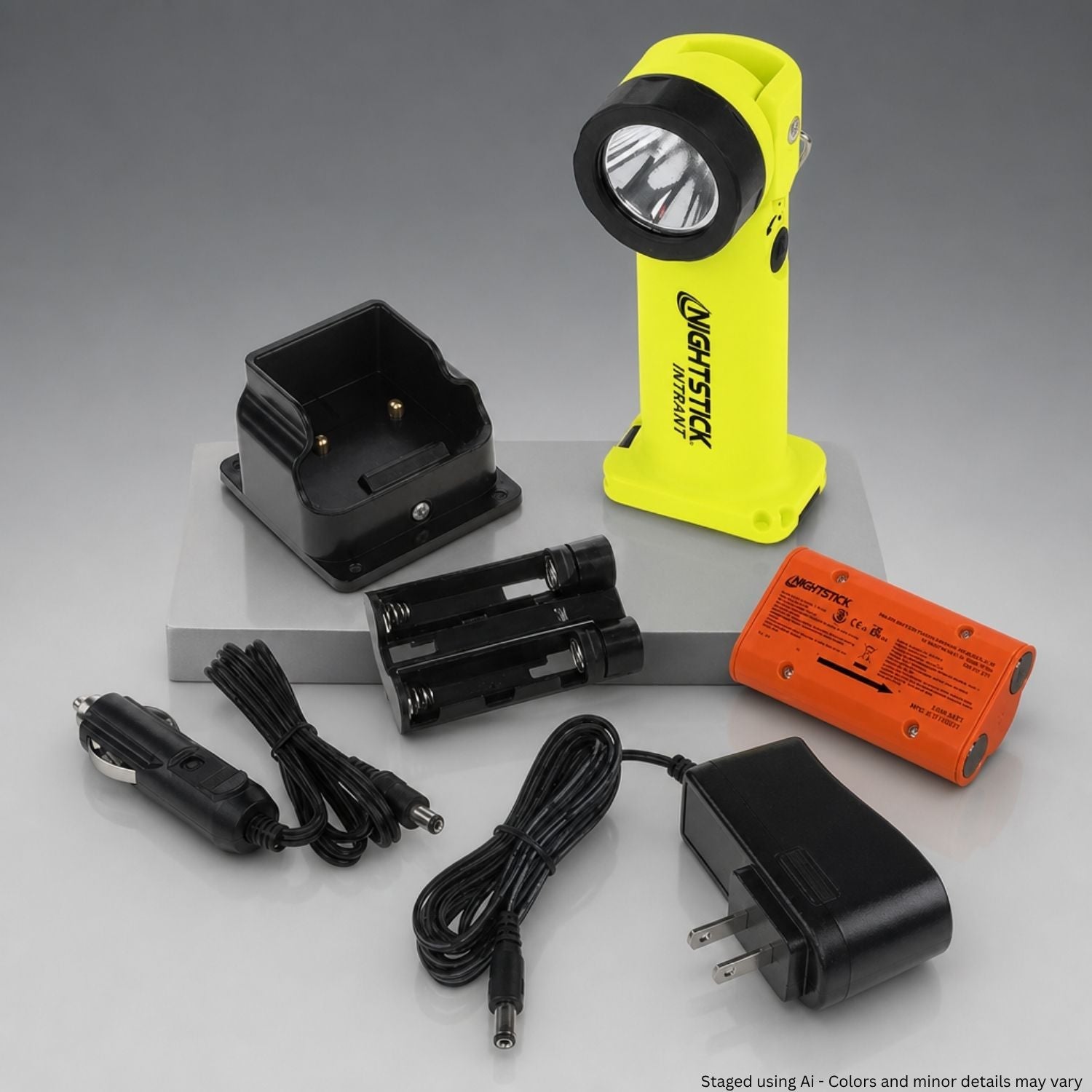 NIGHTSTICK flashlight with accessories on a gray background