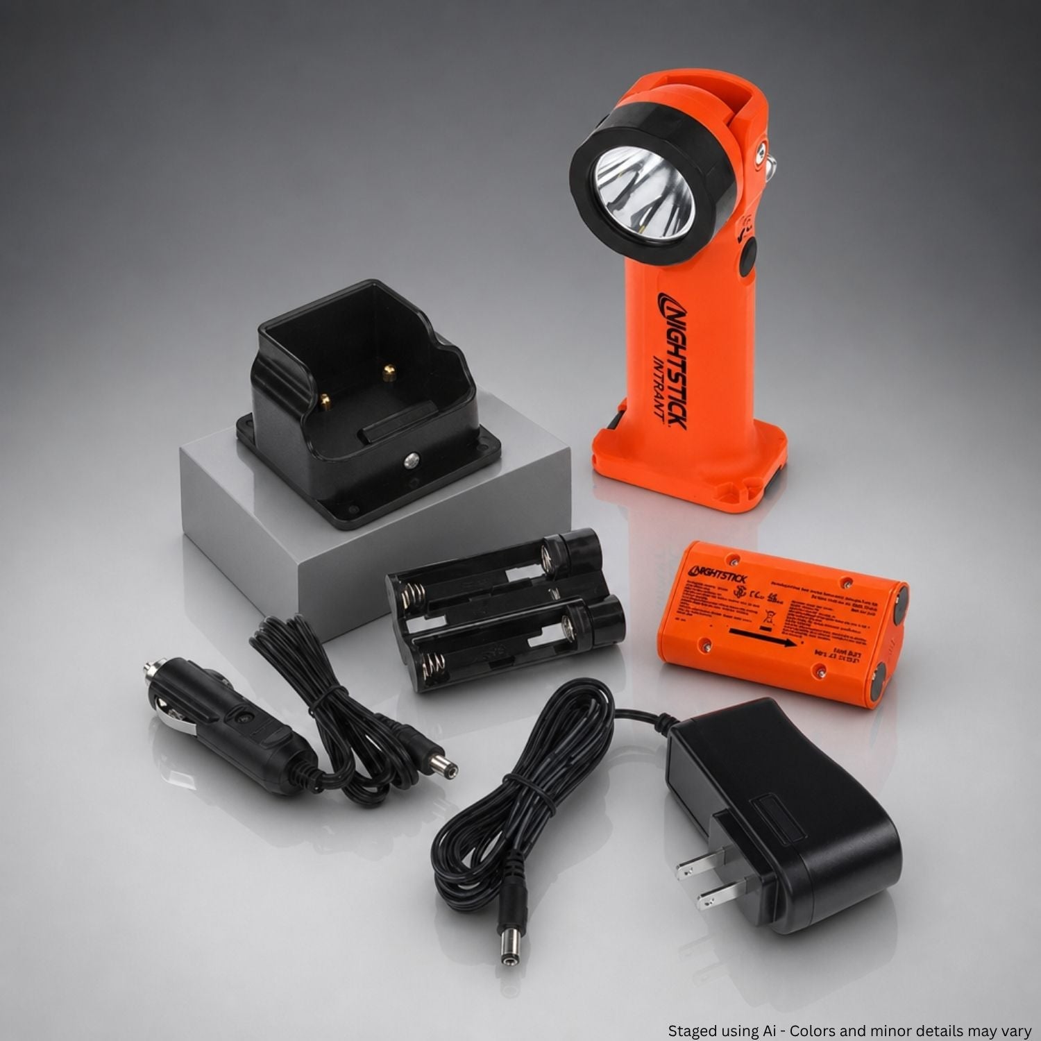 Orange flashlight with accessories on a gray background