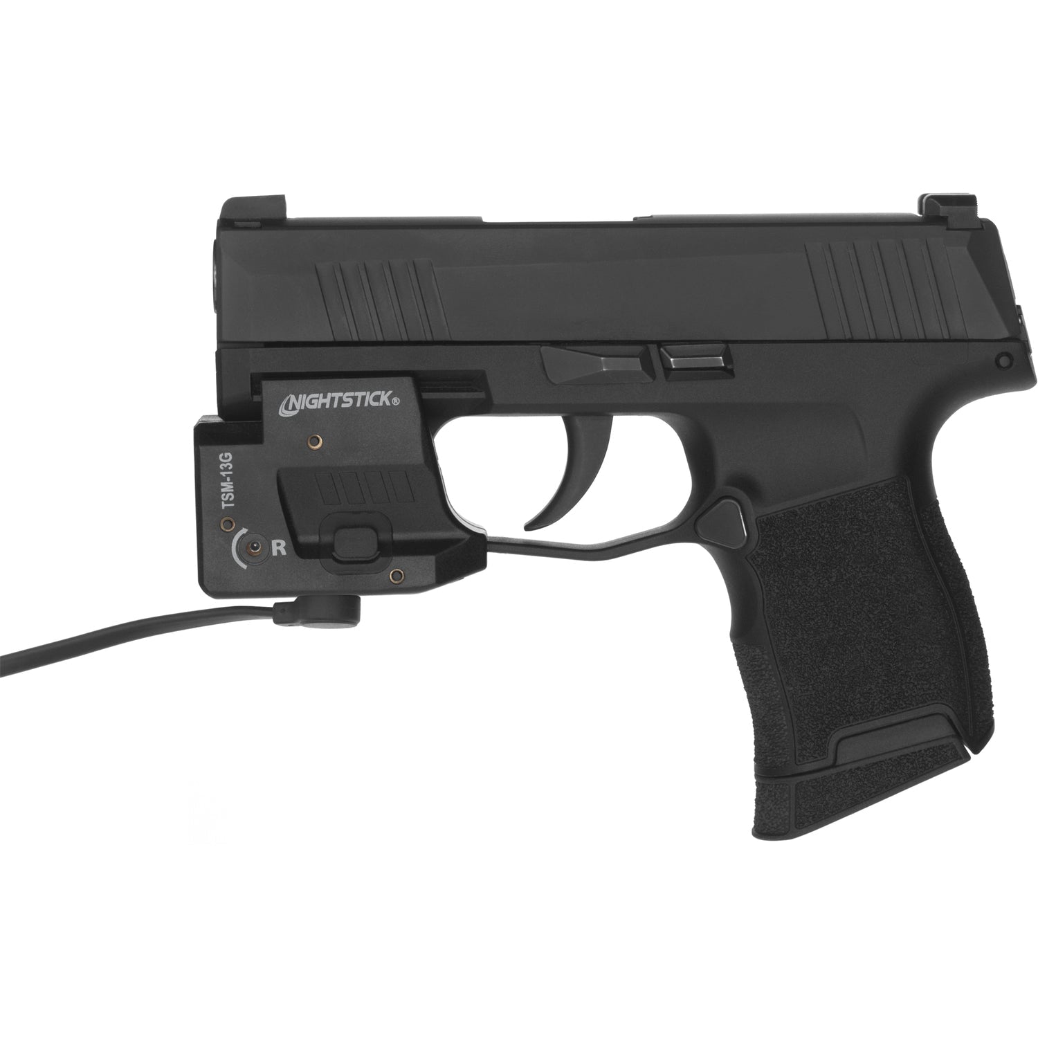 Nightstick TSM-13G mounted on a Sig Sauer P365 with MagMate magnetic charger attached
