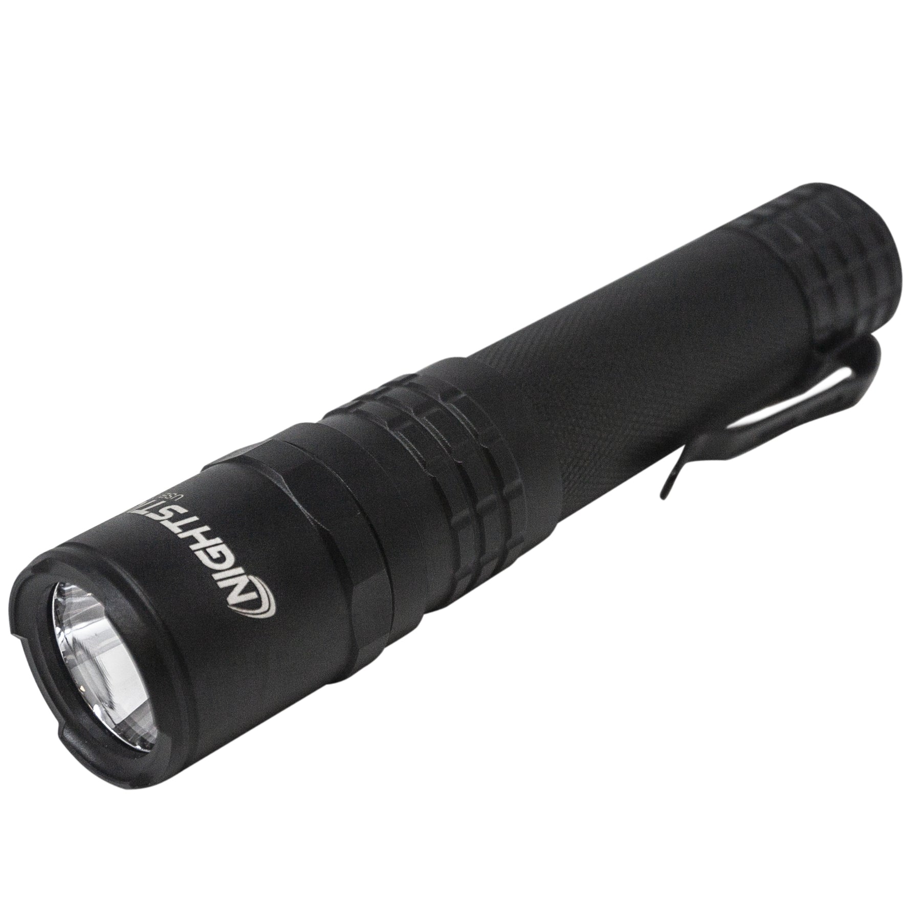 Nightstick USB-558XL tactical flashlight in black, lying flat showing full body profile