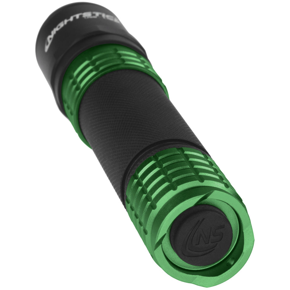 Nightstick USB-558XL-G tactical flashlight in olive green, angled view showing tail cap with NS logo