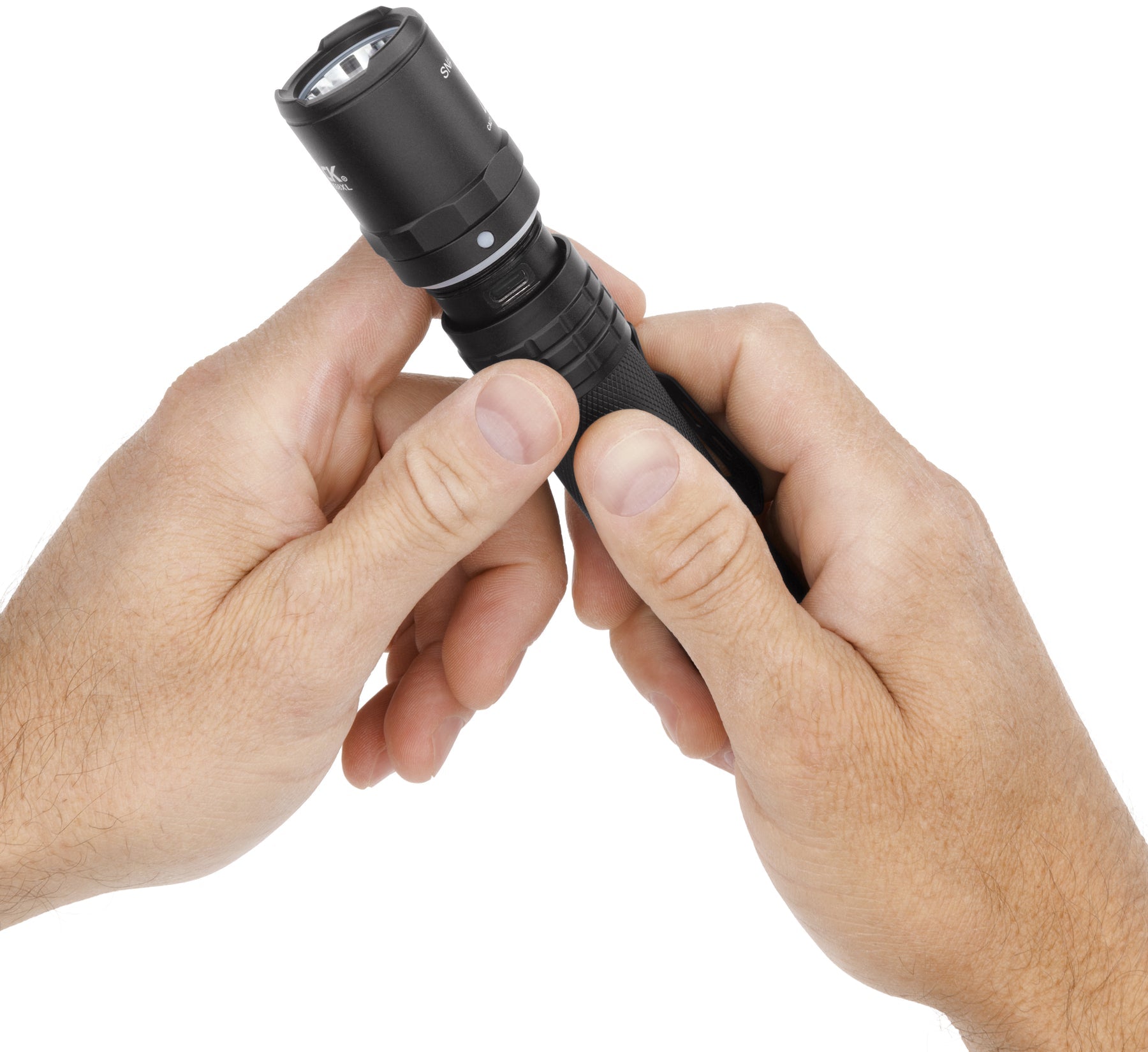 Nightstick USB-558XL tactical flashlight, USB-C charging port open on body