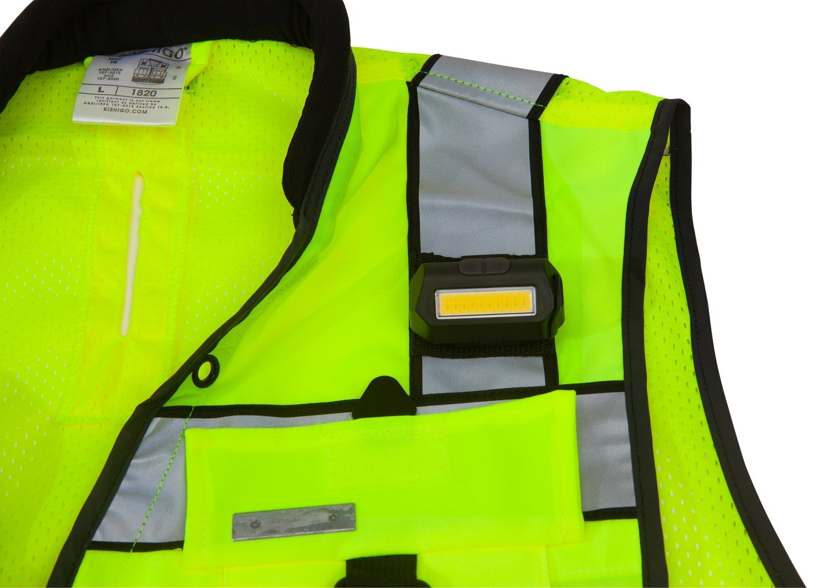 Nightstick Multi-Flood USB Rechargeable Gear Light for MOLLE and Vest Straps on a Yellow safety vest with reflective stripes