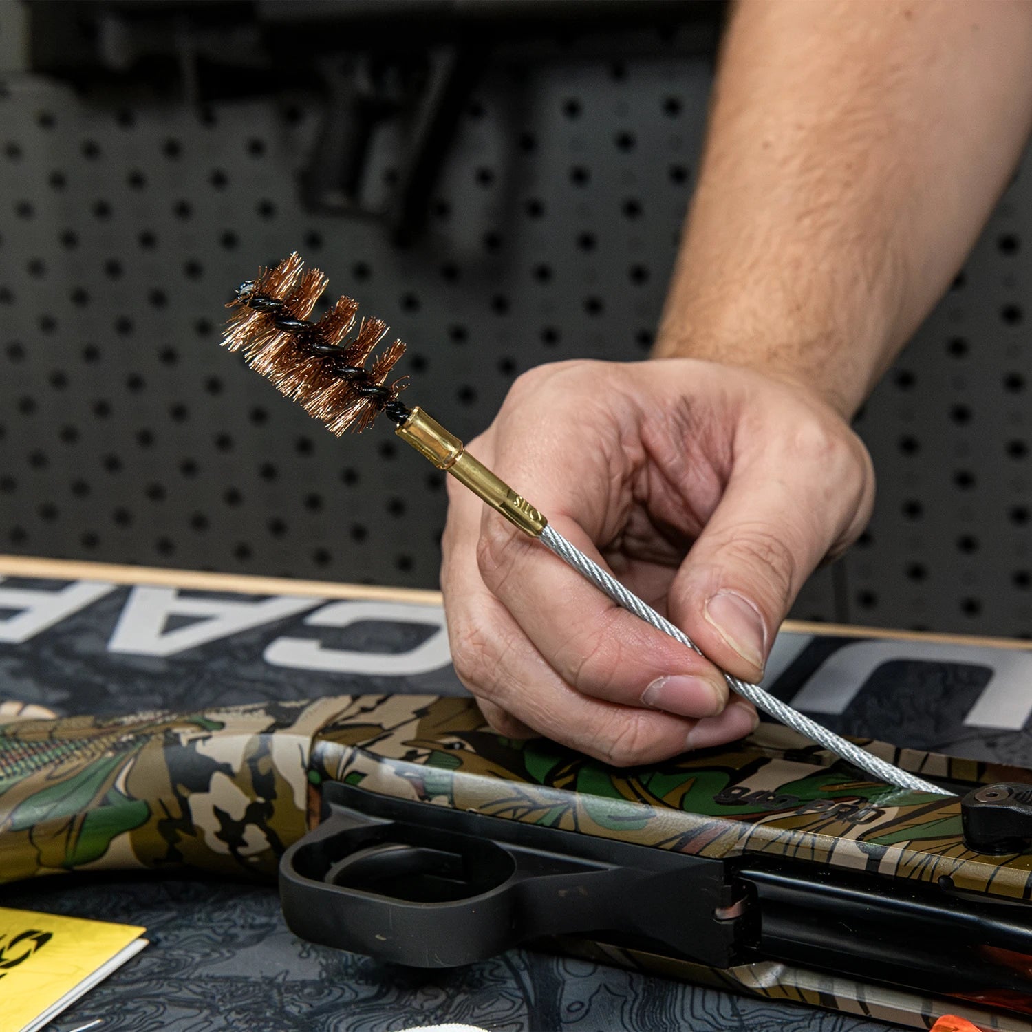 Otis FG-410 bronze bore brush attached to Memory-Flex cable for shotgun cleaning