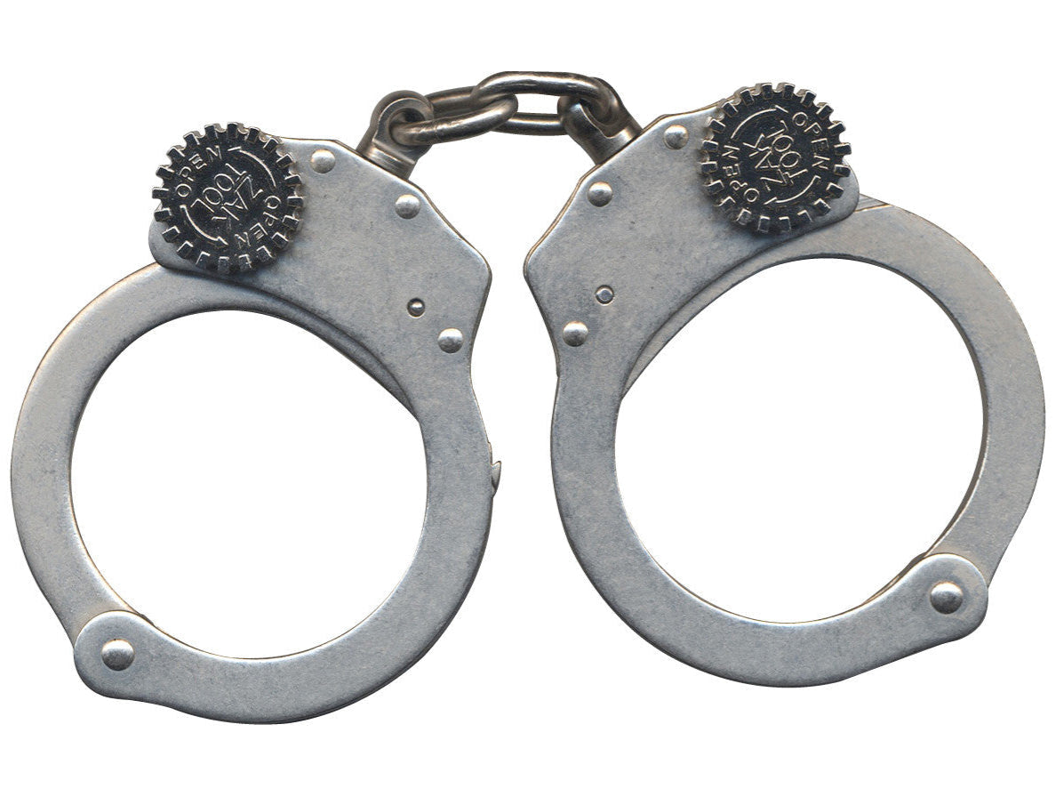 Metallic handcuffs on a white background