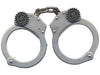 Metallic handcuffs on a white background