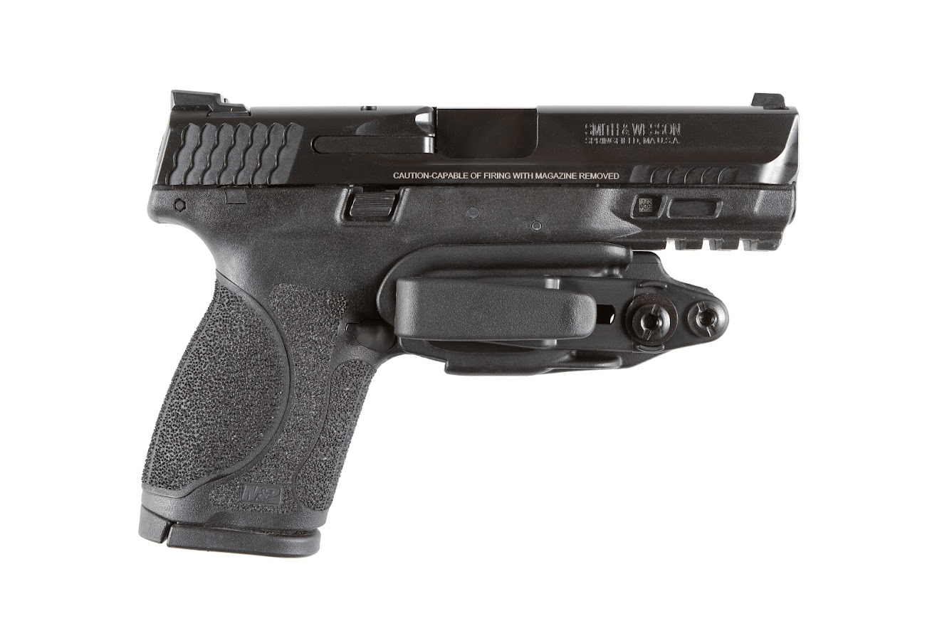 Black minimalist IWB holster with trigger guard coverage for secure firearm carry.