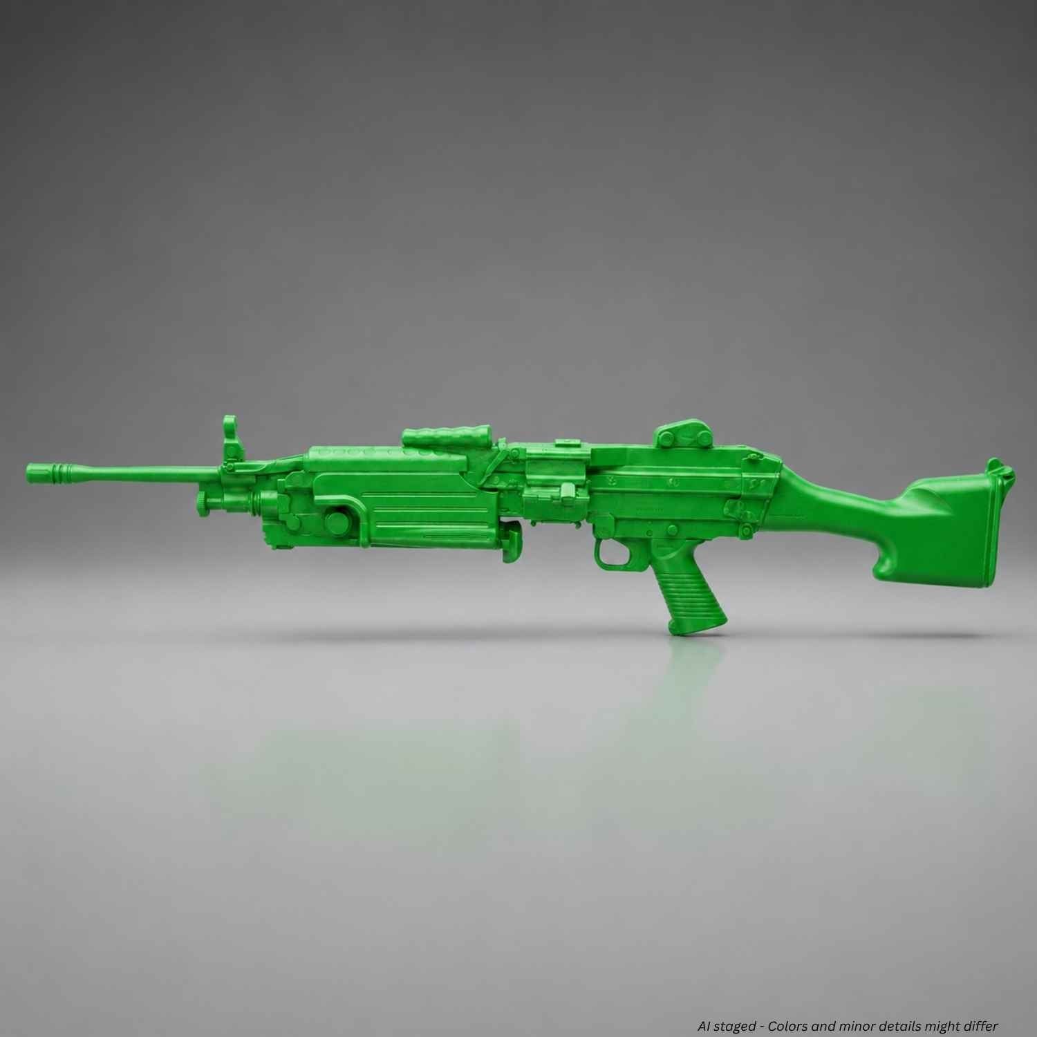 Rings BlueGuns FN M249 SAW FSM249G training replica in green, side view of molded polyurethane body