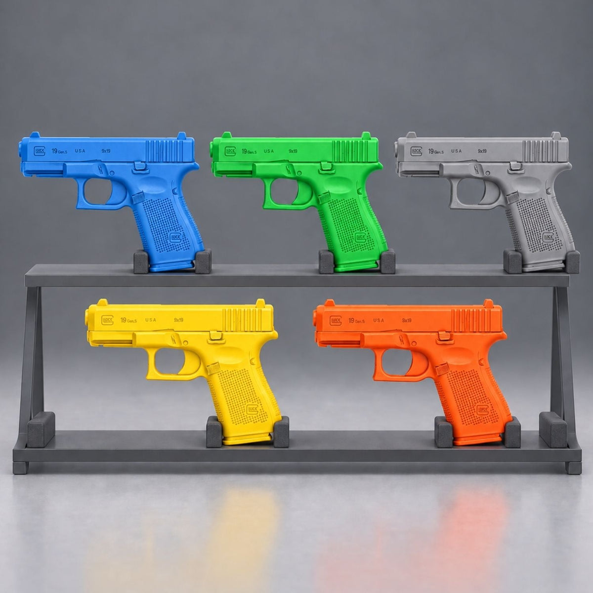 Ring's BlueGuns Glock 19/23/32 Gen 5 inert training replicas in blue, orange, yellow, gray and green