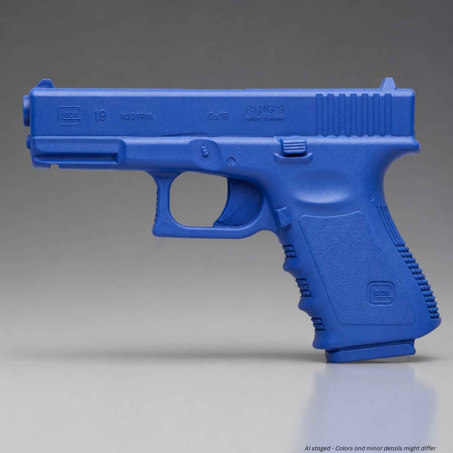 Rings BlueGuns Glock 19 23 32 Generation 3 training gun in law enforcement blue, side view