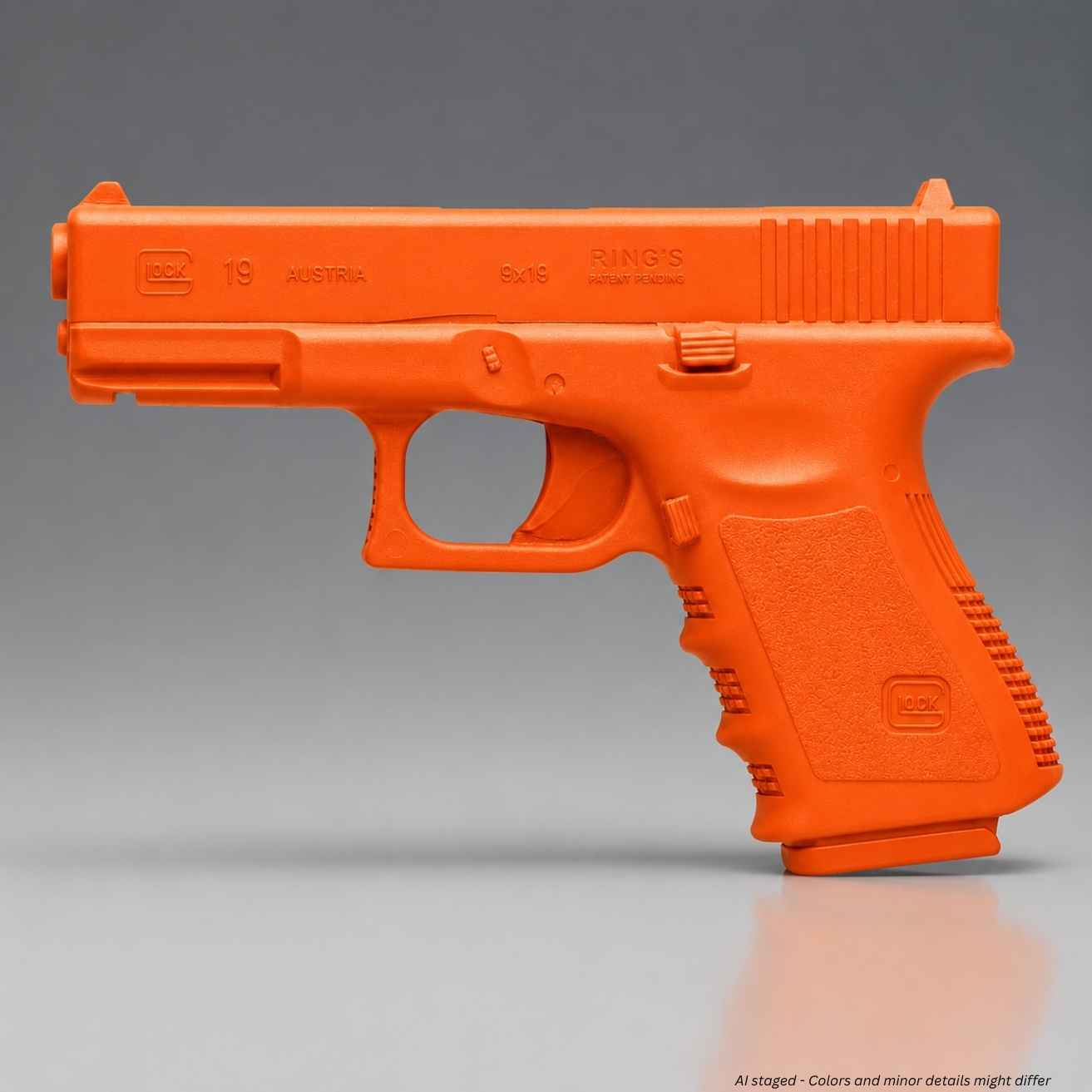 Rings BlueGuns Glock 19 23 32 Generation 3 training gun in orange, side view