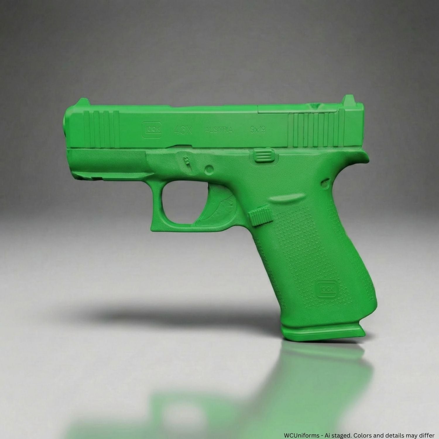 Green training gun on a gray background