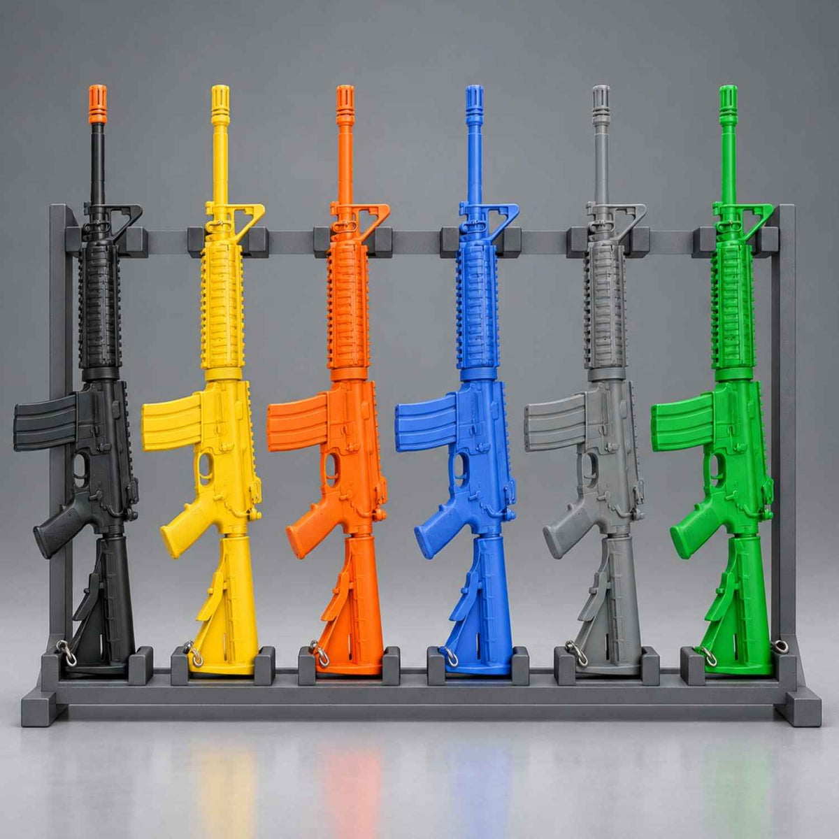 Ring's BlueGuns M4 FSM4FTRCS training rifles in black, yellow, orange, blue, gray and green on a rack; black has an orange tip.