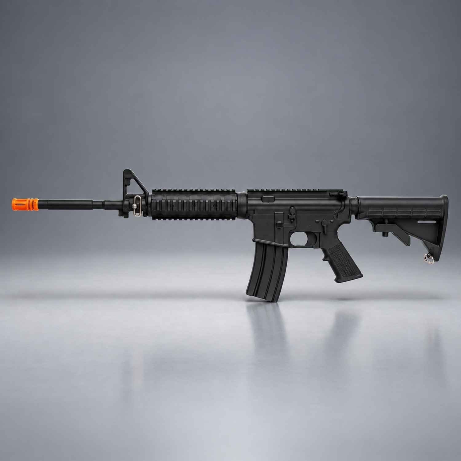 Black Ring's BlueGuns M4 FSM4FTRCS training rifle with orange safety tip, closed stock and forward rail, side view.