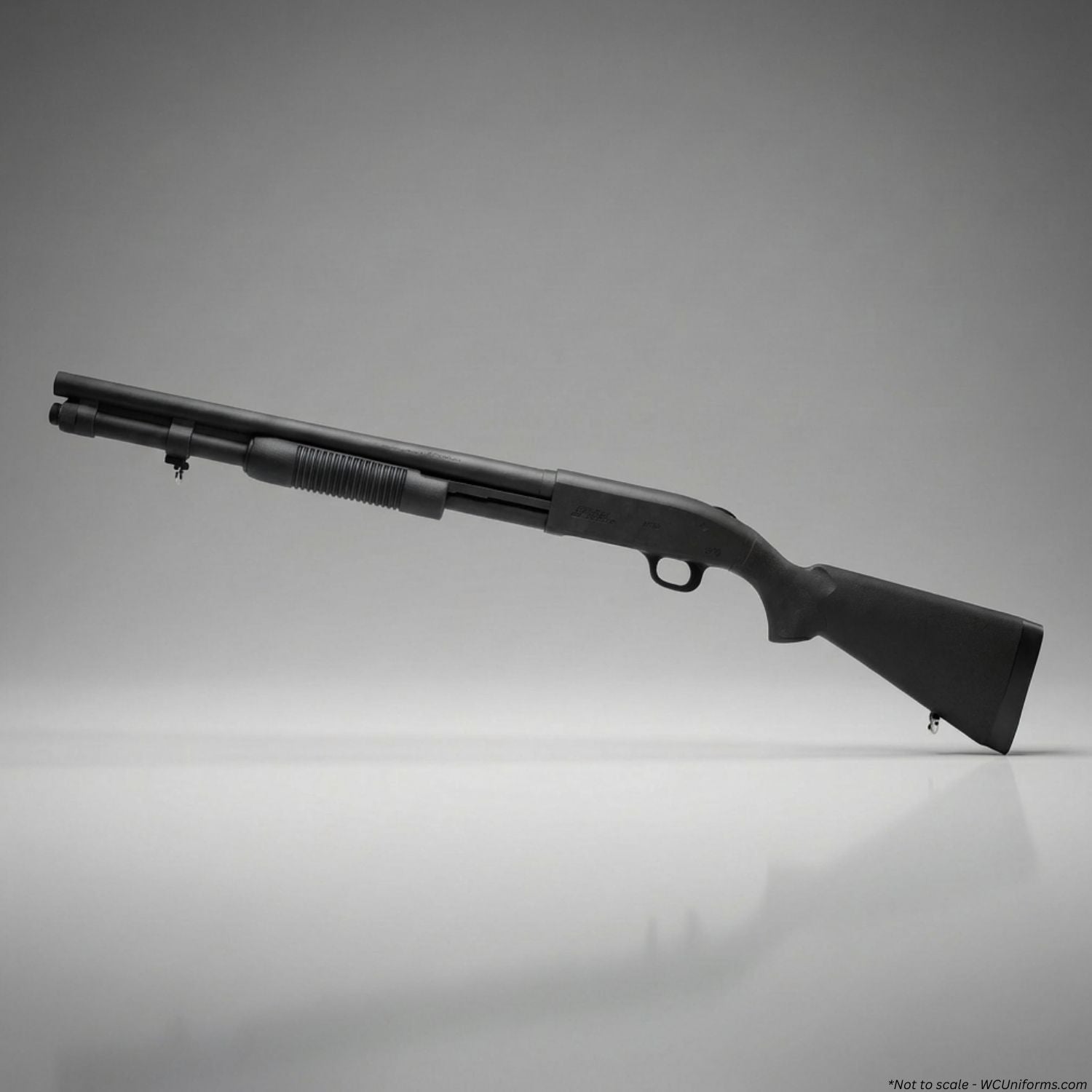 Black training shotgun on a gray background