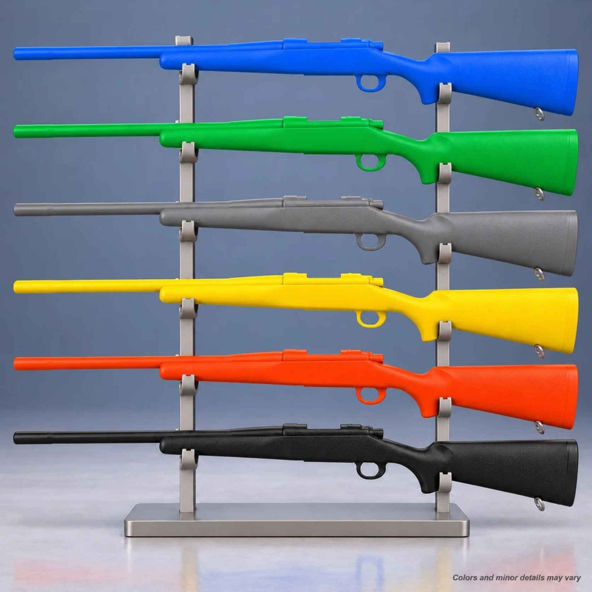 Ring's BlueGuns Remington 700 FS700 training rifles in blue, black, gray, green, orange, and yellow on a rack