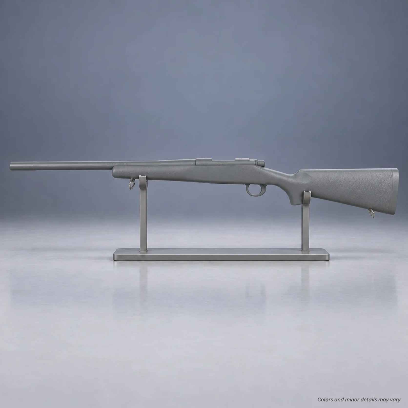 Gray Ring's BlueGuns Remington 700 FS700CG polyurethane training rifle on a display stand