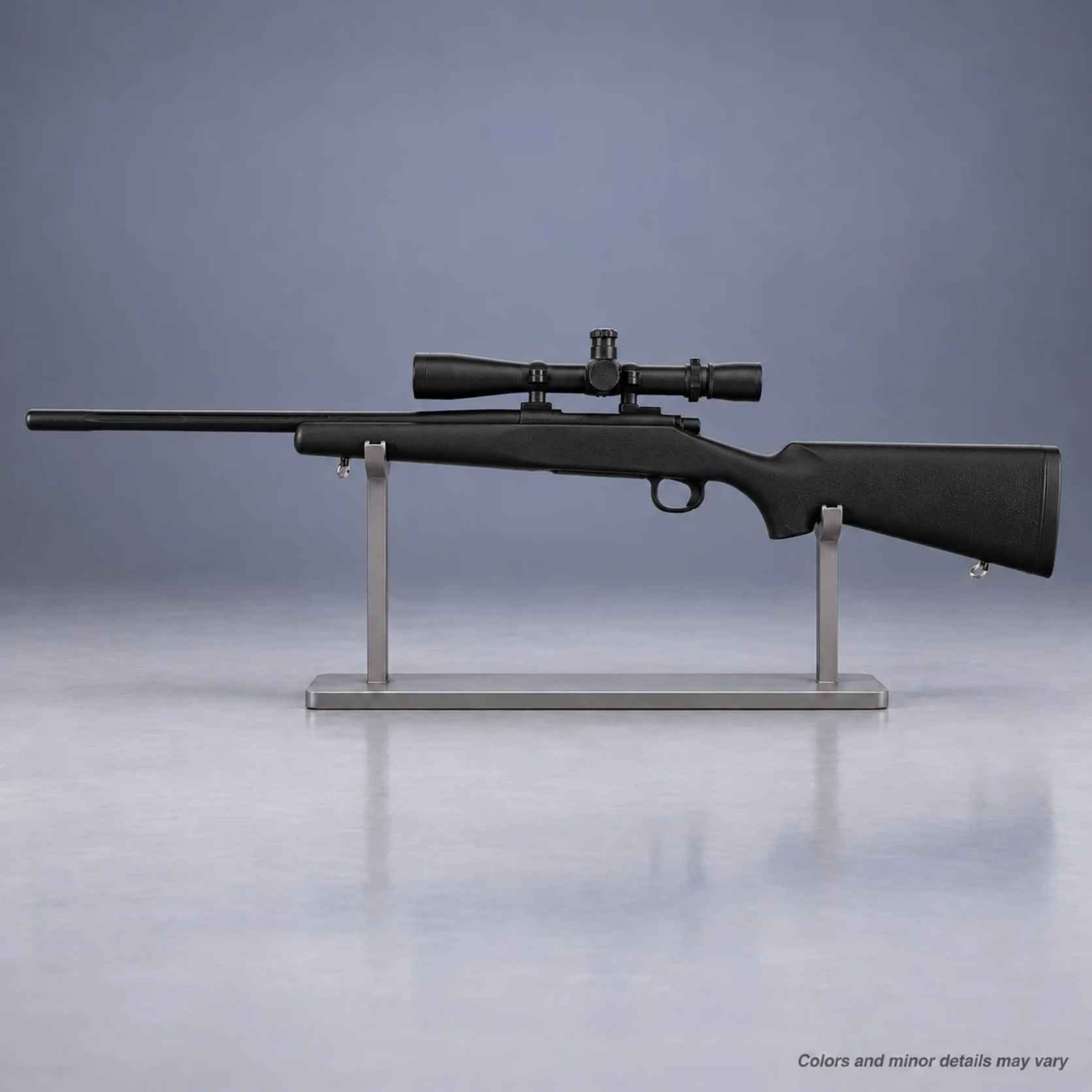 Black Ring's BlueGuns Remington 700 with scope inert training rifle on display rack