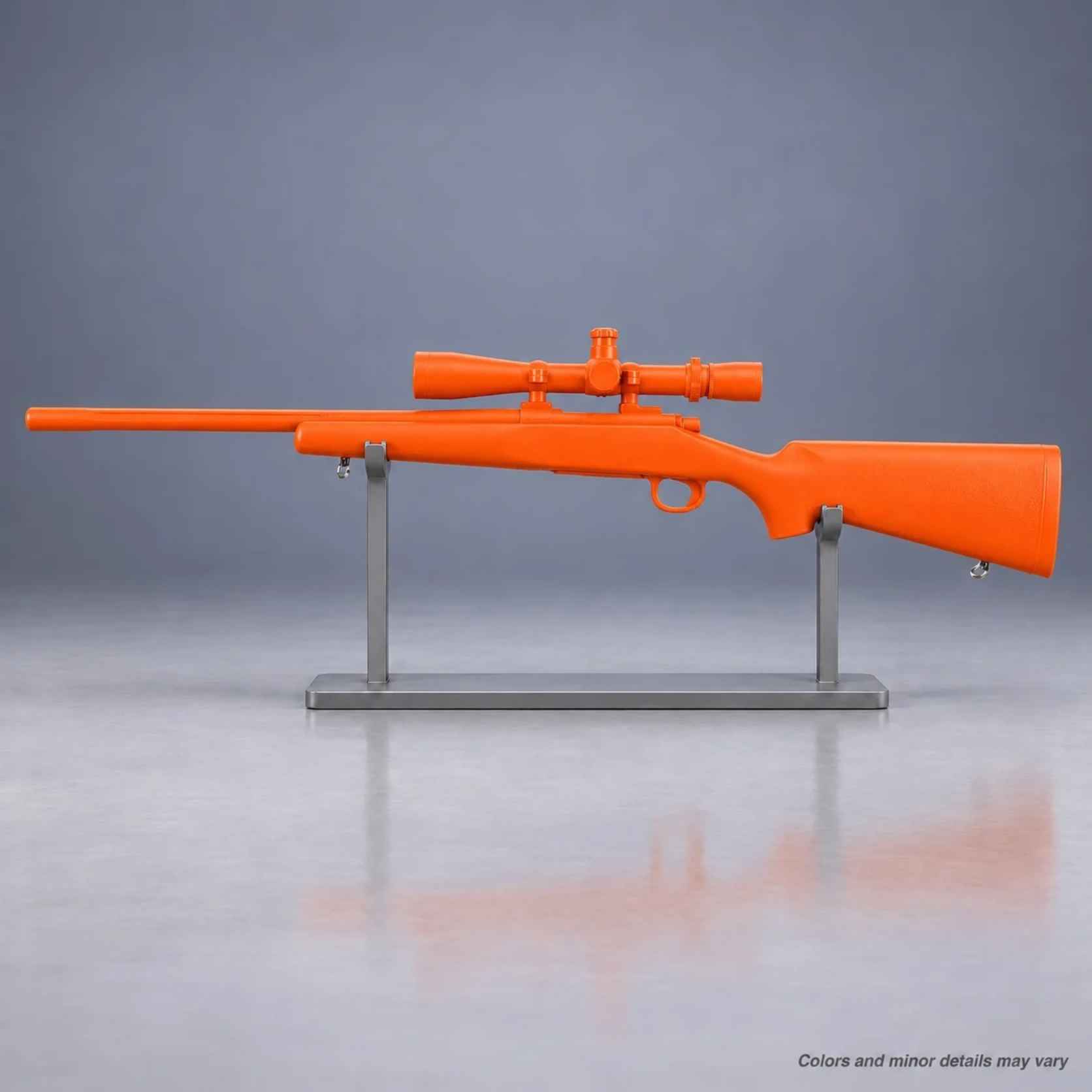Orange Ring's BlueGuns Remington 700 with scope inert training rifle on display rack