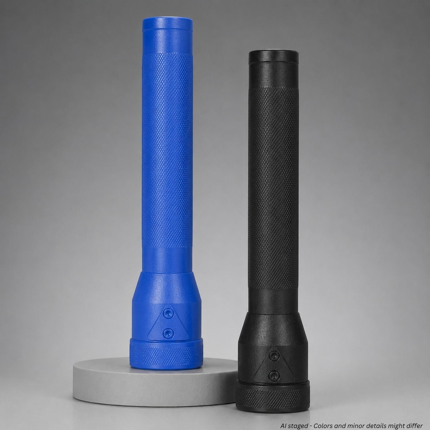 Blue and black police training flashlights on a gray background