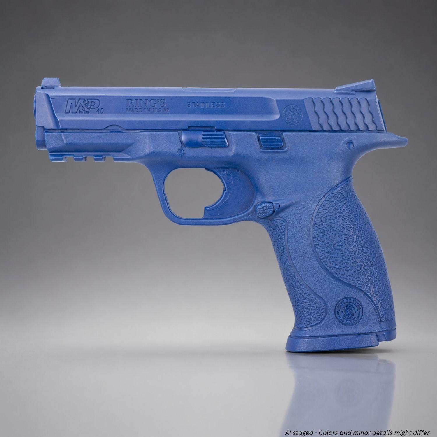 Rings BlueGuns Smith and Wesson M&P 40 4.25 inch blue training pistol, medium backstrap primary view