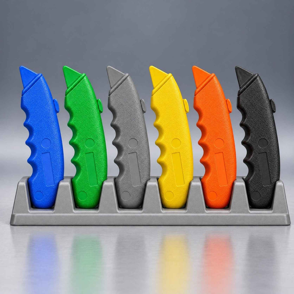 Ring's BlueGuns Training Box Cutter FSTKBC in blue, green, gray, yellow, orange, and black on a six-slot rack