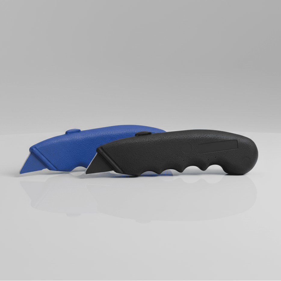 Black and blue plastic stanley knives on a gray background