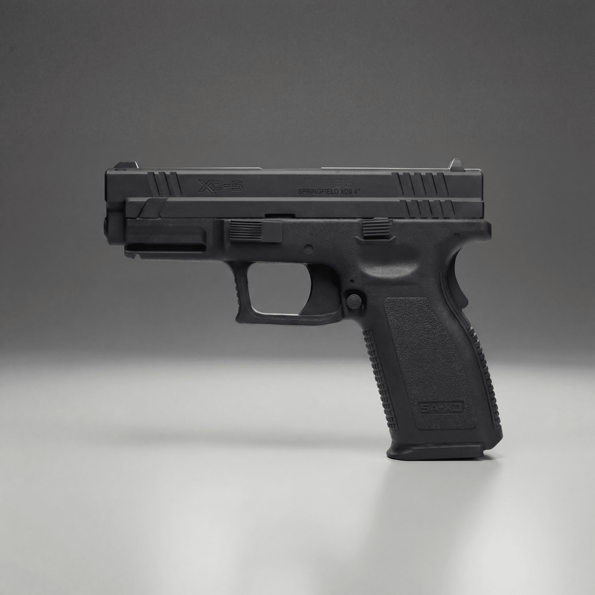 Black Blue Training Guns By Rings Springfield XD9 | FSXD9101 on a gray background