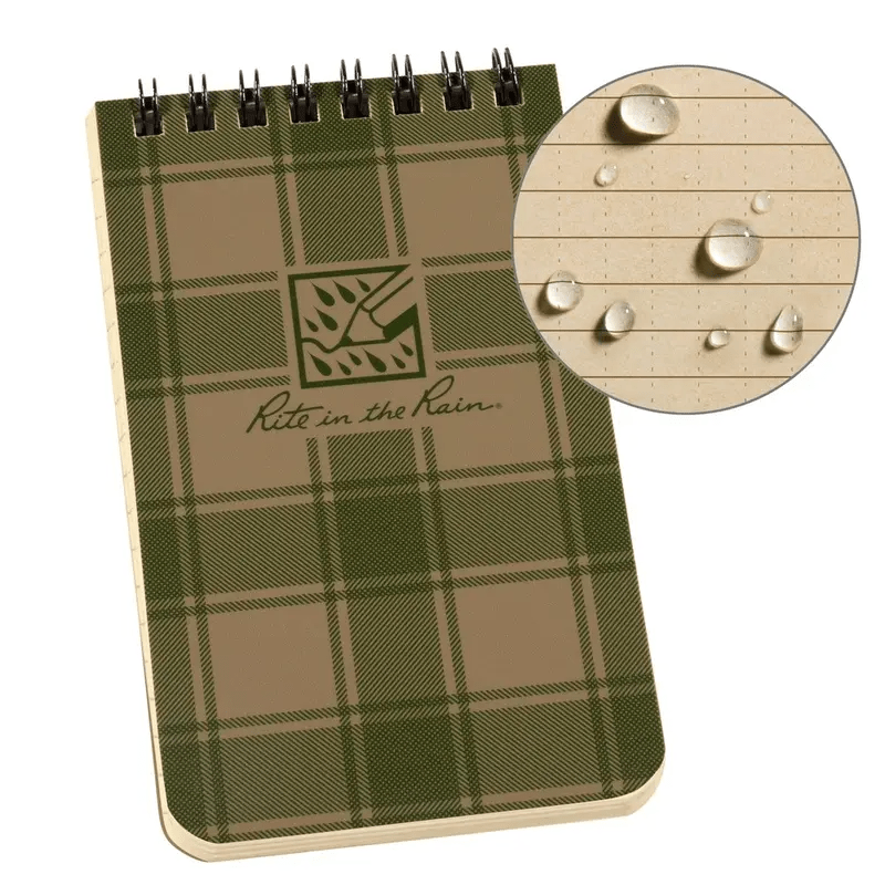 Green plaid notebook with 'Rite in the Rain' logo and waterdrop resistance feature.